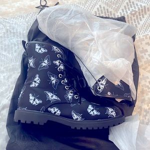 Stunning black combat boots . With gorgeous butterfly patterns all over the boot